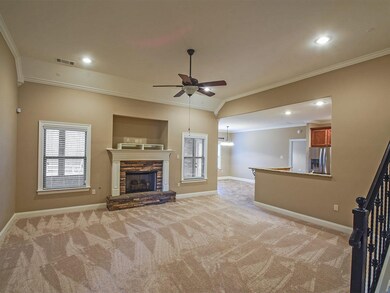 The entry leads to a 17x16 Great Room with its gas fireplace.  Open to the kitchen,this great room might be called a true hearth room.
