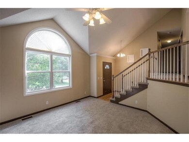 Living room w/ lots of natural light.
