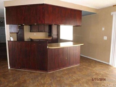 Kitchen with bar area. 