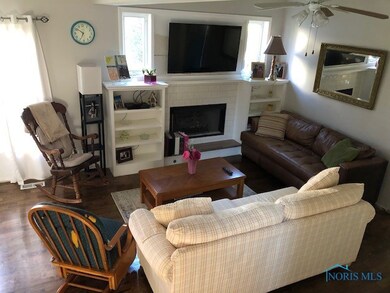 Lovely and cozy living room with new wood flooring