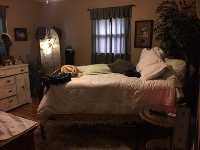Main Floor Master bedroom has hard wood flooring a