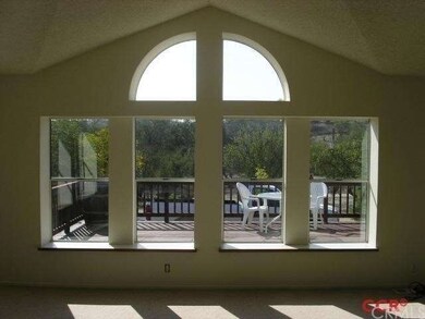 Living room with vaulted ceilings