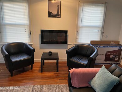 Greater sitting with electric fireplace