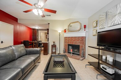Living room featuring light tile patterned floorin