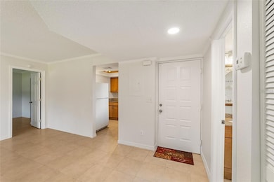 entry area to living room with master to left, guest bath and bedroom to right as view in picture.