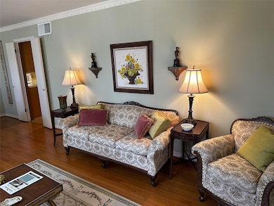 Formal Living Room with Hardwood Flooring
