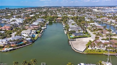 Bird's eye view with a water view and a residentia