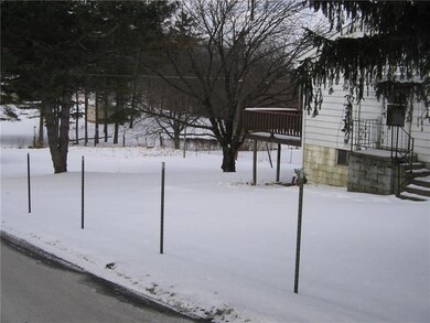 PINE ALLEY AND SIDE VIEW OF YARD