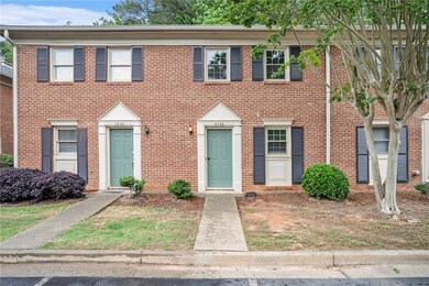 View of front of property with brick siding
