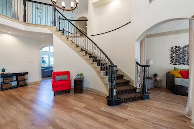 Spacious entry with high ceilings and luxury wide plank vinyl flooring recently installed.