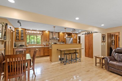 Amazing gourmet kitchen, note barn door to pantry!