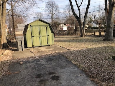 Private Driveway, Leads to spacious fenced backyard, MINI BARN, seated patio areas.