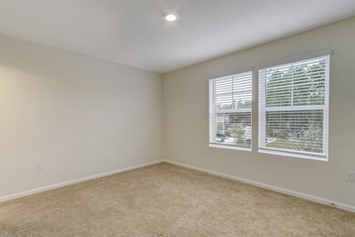 Main bedroom overlooks pond/preservation area and