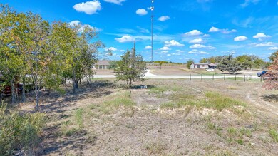 View of yard with a rural view