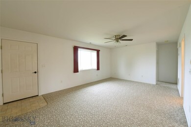 Spacious living room with view to south across vac