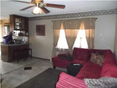 Living room open to eat in Kitchen space.