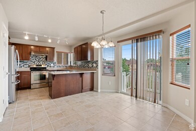 2794 W Harker Ridge Cove, Taylorsville, UT 84129 - photo 2