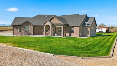Craftsman house featuring a shingled roof, brick siding, and stone siding