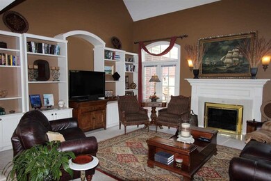 The gorgeous fireplace is the centerpiece of the l