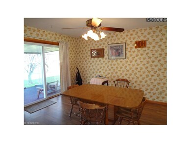 Dining area just off the kitchen, wood laminate fl
