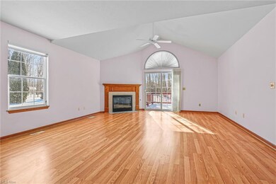 Great Room with gas fireplace and access to deck