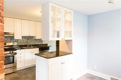 Kitchen has pass through to dinning room with grea