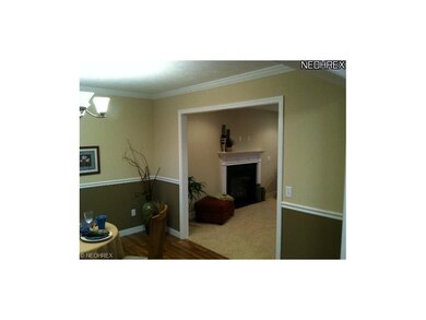 Dining room has 2 tone paint and many extra moldin