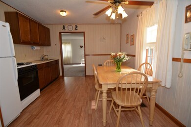 New wood laminate flooring in the eat-in kitchen