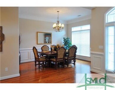 Dining Room. Lots of windows and high ceilings  ma