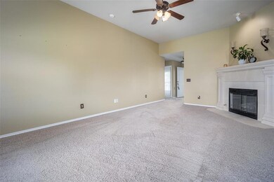 Unfurnished living room featuring carpet floors an