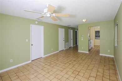 Large living room with view to kitchen.