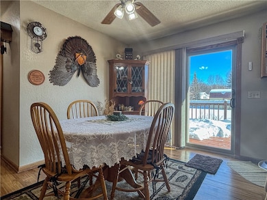 Dining Area with deck offering sleek power awning