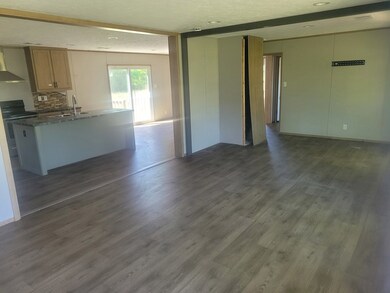 LIVING ROOM INTO KITCHEN