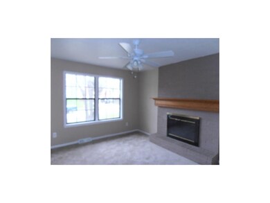 Lovely Fire Place in the Living Room!  Fresh Paint and Carpet!
