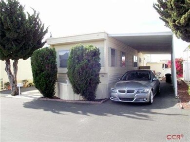 Front view with attached carport