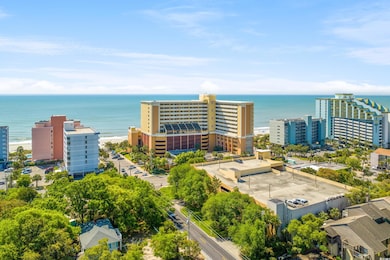 Aerial view with a water view and a view of city