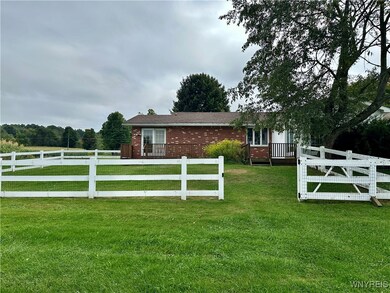 Fenced in area in rear- view of home- single famil
