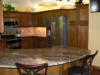 No shortage of cabinets or counter top space in th