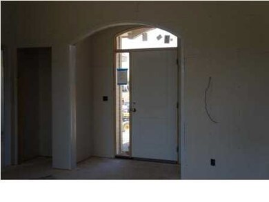 As you walk into the home the entry features a bar
