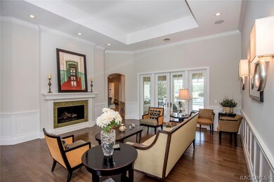 A beautiful gas fireplace is the jewel of this roo