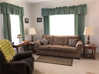 Living room showcasing large windows