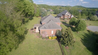 Enjoy relaxing and entertaining on this large private level lot.