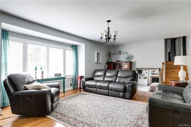 View of the living room with hardwood floors, pict