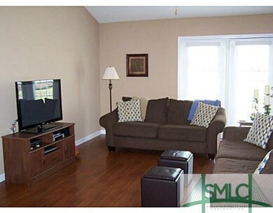 Den/Family/Great Room. The laminate wood flooring 