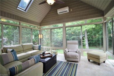 Four seasons sun room with skylights, vaulted ceiling, & ceiling fan. Heated & cooled so you can enjoy it year round!  Beautiful view of backyard.