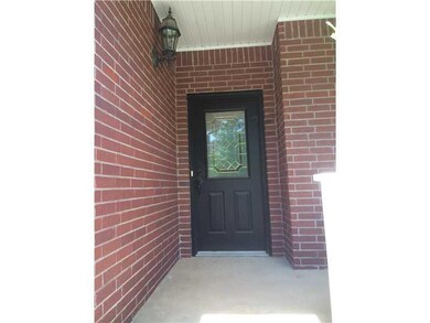 Exterior Front. Beautiful door invites you inside.