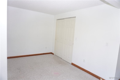 Room off living room could be bedroom or office or