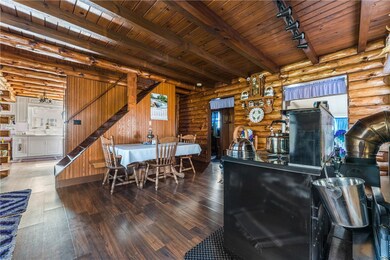 View to kitchen, additional living space to right
