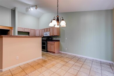 Vaulted ceiling and breakfast bar.