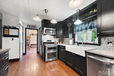 UPDATED KITCHEN VIEW INTO DINING ROOM